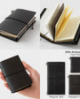 Black leather notebook with various sizes shown on a white background