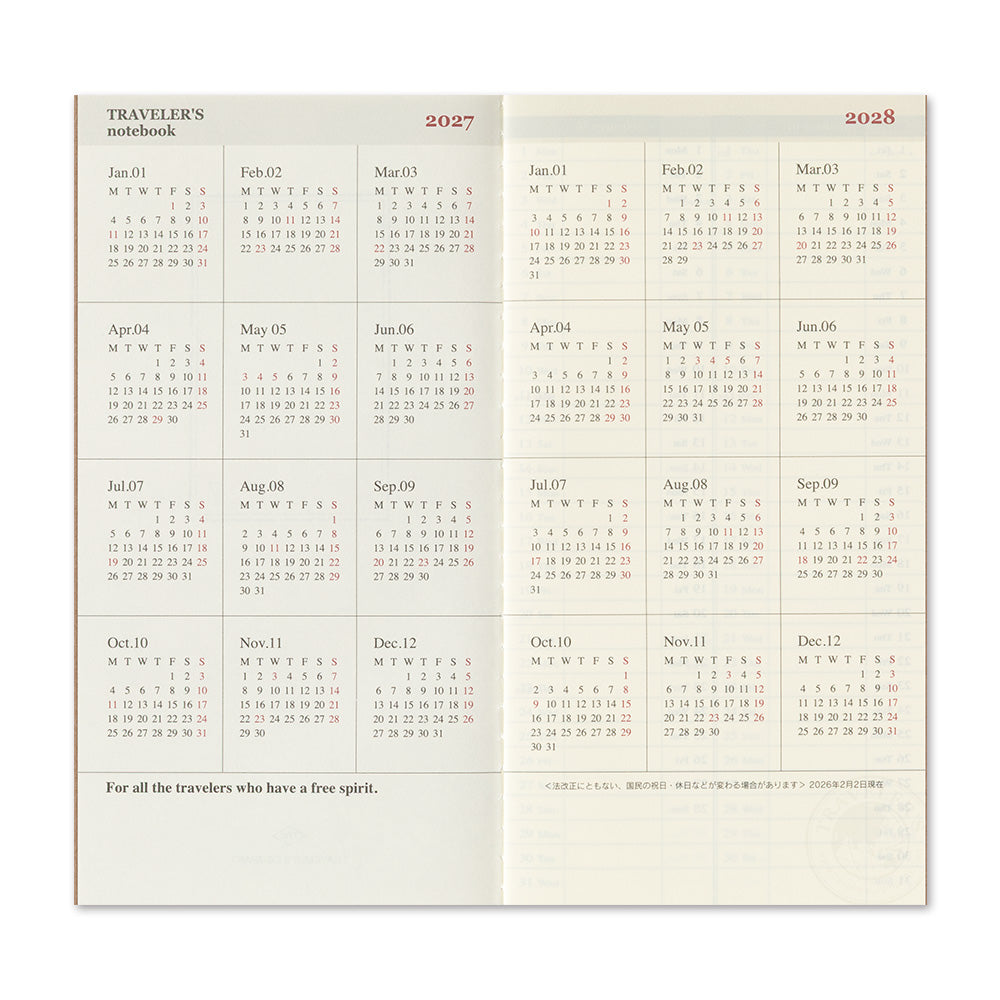 A 2027 to 2028 travelers' notebook calendar spread showing a monthly layout in beige and cream tones with the text 'TRAVELER'S notebook' and 'For all the travelers who have a free spirit.'.