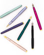 Set of colorful fountain pens on a white background