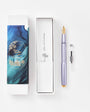 Fountain pen with packaging and ink cartridge on a white background