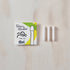 Toni's Studio Ori bullet tip packaging with three white cylindrical items on a wooden surface