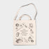 Tote bag with illustrations and text on a light gray background