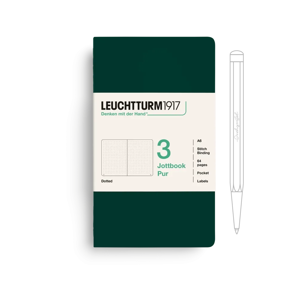 Green notebook with white label and pen on a white background