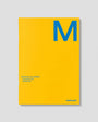 Yellow planner with blue 'M' and 'mishmash' branding on a gray background