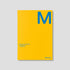 Yellow planner with blue 'M' and 'mishmash' branding on a gray background