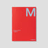 Red planner with a large 'M' on a gray background