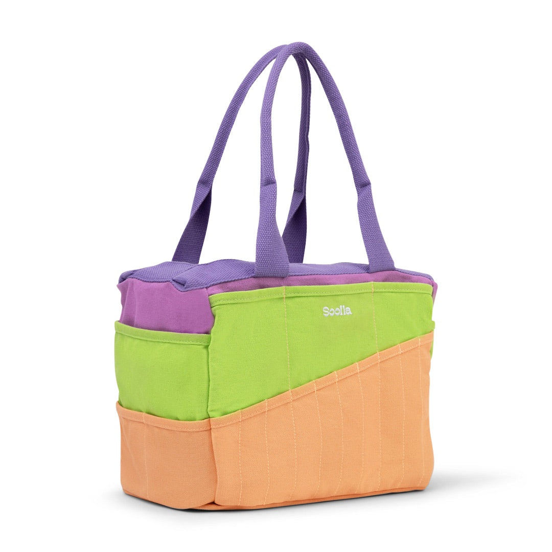 Colorful tote bag with purple, green, and orange sections on a white background